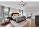 Bright bedroom featuring neutral decor, ample natural light and hardwood floors at 2383 Colonial Ne Dr, Brookhaven, GA 30319