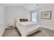 Serene bedroom featuring a comfortable bed and soft, natural light at 2383 Colonial Ne Dr, Brookhaven, GA 30319