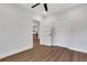 Bedroom boasting hard wood floors, natural lighting, ceiling fan and closet at 2383 Colonial Ne Dr, Brookhaven, GA 30319