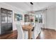 Formal dining room with stylish chandelier, hardwood floors, and neutral decor for elegant dining at 2383 Colonial Ne Dr, Brookhaven, GA 30319