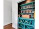 Stylish built-in wine rack with shelves and storage for wine bottles and liquor at 2383 Colonial Ne Dr, Brookhaven, GA 30319