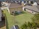 Aerial view of expansive backyard, showcasing lush green lawn and surrounding homes at 2592 Jacanar Sw Ln, Atlanta, GA 30331