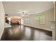 Open-concept living room flows from the kitchen features hardwood floors and natural light at 2592 Jacanar Sw Ln, Atlanta, GA 30331