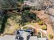 Aerial shot of landscaped backyard with deck, stone pathway and fenced perimeter at 3979 Sentry Xing, Marietta, GA 30068