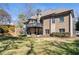 Exterior view of a brick home with a well-maintained lawn and a raised back deck at 3979 Sentry Xing, Marietta, GA 30068