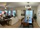 Open-concept living and dining area with ample seating and natural light, perfect for entertaining at 1281 Rockfield Cir, Norcross, GA 30093