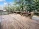 Large wooden deck offering an outdoor space for relaxation and entertainment at 1444 Twin Branches Se Cir, Marietta, GA 30067