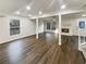 Spacious living room with hardwood floors, fireplace, and plenty of natural light at 1444 Twin Branches Se Cir, Marietta, GA 30067