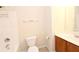Simple bathroom with tiled floors, a combination tub and shower, and a single sink vanity at 460 Chandler Bluff Ct, Grayson, GA 30017