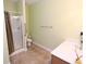 Clean and functional bathroom with a walk-in shower and tile flooring at 460 Chandler Bluff Ct, Grayson, GA 30017