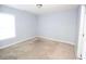 Bedroom featuring a neutral painted walls, carpeted floor and a window at 460 Chandler Bluff Ct, Grayson, GA 30017