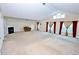 Bonus room featuring a fireplace, lots of natural light, and neutral walls at 460 Chandler Bluff Ct, Grayson, GA 30017