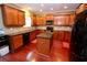 Well-appointed kitchen featuring granite countertops and stainless steel appliances at 460 Chandler Bluff Ct, Grayson, GA 30017