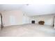 Spacious living room featuring vaulted ceilings, a fireplace, and natural light at 460 Chandler Bluff Ct, Grayson, GA 30017