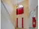 Grand two-story foyer with a staircase, decorative lighting, and a view of the front door at 477 Harvick Cir, Stockbridge, GA 30281