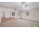 Spacious living room featuring plush carpeting, hardwood floors, and plenty of natural light, a great spot at 100 Hunters Keep Trce, Covington, GA 30014