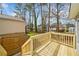 New wooden deck provides a wonderful view of the backyard and neighborhood at 1389 Ling Dr, Austell, GA 30168