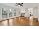 Bright living room with hardwood floors, ample natural light and wet bar at 3084 Brookshire Way Way, Duluth, GA 30096