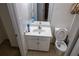 Bathroom with a white sink and a toilet at 1159 Bowerie Chase, Powder Springs, GA 30127