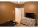 Bedroom with neutral walls, double doors, and space for a bed, offering a calm and inviting atmosphere at 1159 Bowerie Chase, Powder Springs, GA 30127