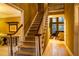 Grand foyer showcasing staircase and hardwood floors that lead into the bright living space at 1159 Bowerie Chase, Powder Springs, GA 30127