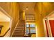 Bright foyer boasting staircase and an open view into the well-lit living area at 1159 Bowerie Chase, Powder Springs, GA 30127