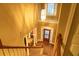 Grand foyer featuring hardwood floors and a chandelier at 1159 Bowerie Chase, Powder Springs, GA 30127