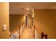 Spacious hallway with neutral carpet and a view of the home's interior at 1159 Bowerie Chase, Powder Springs, GA 30127