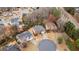 Bird's eye view of the property showcasing its position in a cul-de-sac and surrounded by lush greenery at 1900 Sanborne Way, Dacula, GA 30019