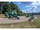 Community playground featuring slides, climbing structures, and a bench, perfect for outdoor Gathering fun at 1900 Sanborne Way, Dacula, GA 30019