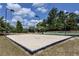 Outdoor sand volleyball court with lighting, inviting residents for friendly games and active recreation at 1900 Sanborne Way, Dacula, GA 30019