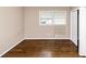 Bedroom with hardwood floors, closet, and natural light from the window at 2458 Kelly Lake Dr, Decatur, GA 30032