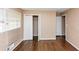 Bedroom featuring hardwood floors, window, and closet for storage at 2458 Kelly Lake Dr, Decatur, GA 30032