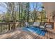 A spacious deck with outdoor seating overlooks the backyard at 2781 Hollywood Dr, Decatur, GA 30033