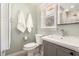 This charming bathroom features a modern sink, toilet, and a window that brings in natural light at 2781 Hollywood Dr, Decatur, GA 30033