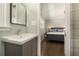 Bathroom with sink and view of bright bedroom with hardwood floors at 2781 Hollywood Dr, Decatur, GA 30033