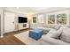 Bright living room featuring hardwood floors, recessed lighting, a neutral color palette and a large window at 2781 Hollywood Dr, Decatur, GA 30033