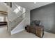 Foyer view with staircase, adjacent office area, and modern wall design at 2905 Ivy Mill Drive Dr, Buford, GA 30519