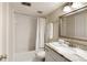 All-white bathroom featuring a vanity, toilet and shower/tub combo at 168 Maribeau Nw Sq, Atlanta, GA 30327