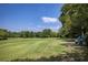 Scenic view of the green golf course on a bright sunny day at 168 Maribeau Nw Sq, Atlanta, GA 30327