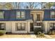 Exterior view of townhome with slate roof and neutral paint at 168 Maribeau Nw Sq, Atlanta, GA 30327