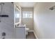 Updated bathroom with marble-look tile shower and granite vanity at 3651 Tulip Dr, Decatur, GA 30032