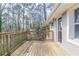 Exterior view of a house deck featuring a wooden railing offering an outdoor relaxation area with great sunlight at 3651 Tulip Dr, Decatur, GA 30032