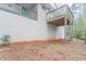 Home back exterior with an elevated deck highlighting space and natural landscape around the property at 3651 Tulip Dr, Decatur, GA 30032