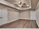 Finished basement featuring recessed lighting, ceiling fan, and wood-look floors at 370 Laurel Oak Dr, Suwanee, GA 30024