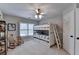 Bedroom features a bunkbed, ceiling fan, and a window providing natural light at 370 Laurel Oak Dr, Suwanee, GA 30024