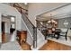 Grand foyer featuring a staircase, hardwood floors, and dining room entrance at 370 Laurel Oak Dr, Suwanee, GA 30024