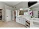 Bathroom with white vanity, soaking tub, shower, and vanity space at 370 Laurel Oak Dr, Suwanee, GA 30024