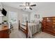 Cozy bedroom features a bed, dresser, and windows providing natural light at 48 Lantern Trce, Hiram, GA 30141