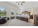 Serene main bedroom with natural light, a large bed, and ample space for relaxation at 48 Lantern Trce, Hiram, GA 30141